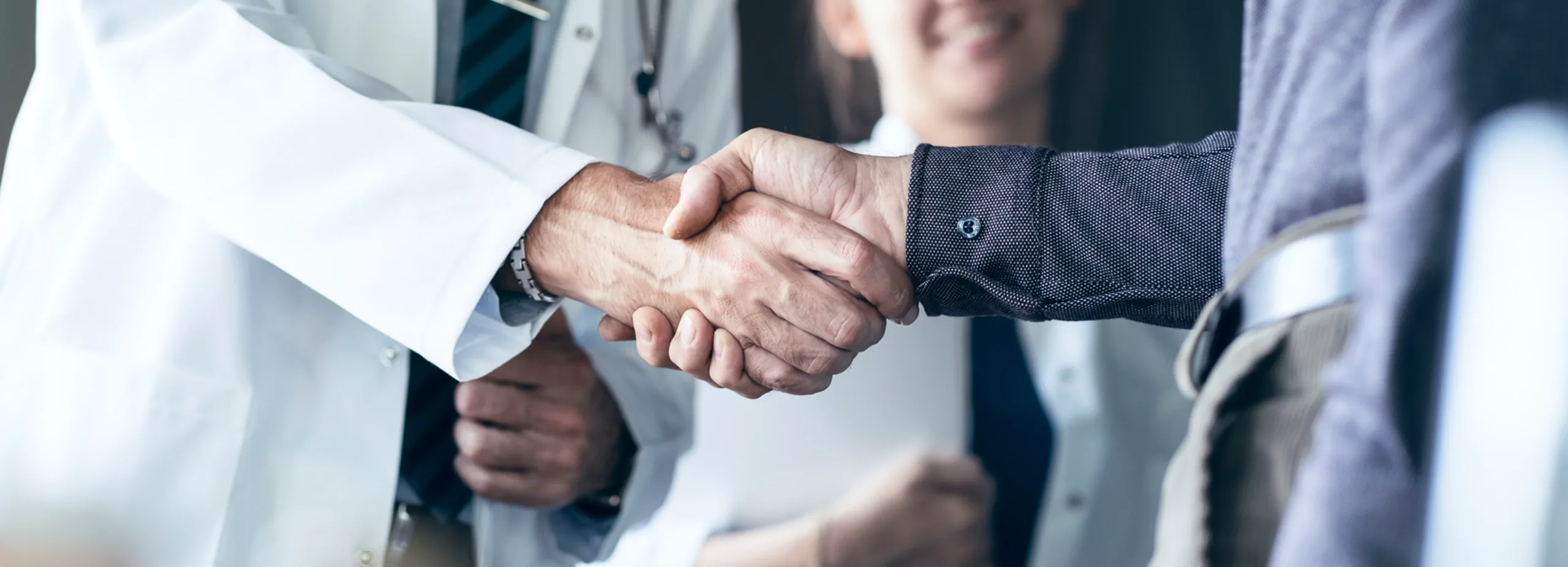 Orange County Medical Solutions Doctor and patient shaking hands